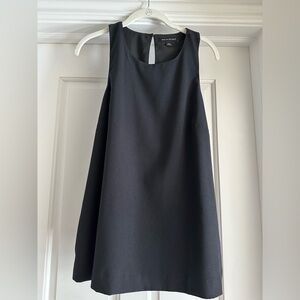 Black Banana Republic tank with racer back detail and slight A line fit.